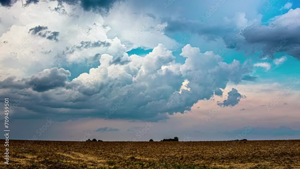 An ominous sky timelapse on an agricultural field
