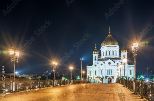 Cathedral of Christ the Savior and Patriarshy bridge at night in Moscow, Russia