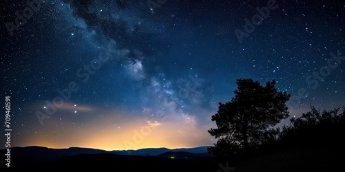 night sky filled with stars over a quiet, remote landscape, capturing the vastness of the universe.