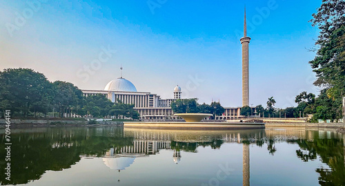 Istiqlal Mosque reflecting in the pond in Jakarta photo