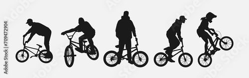 Set of silhouettes of BMX cyclist. Isolated on white background. Graphic vector illustration.