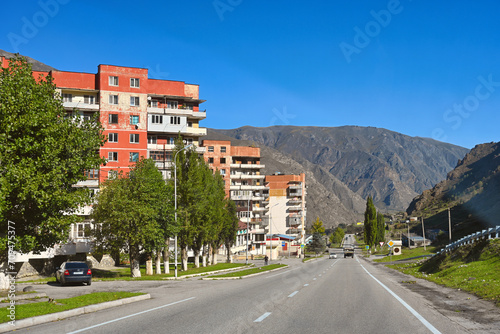 Residential buildings along the road in Tyrnyauz mountain city