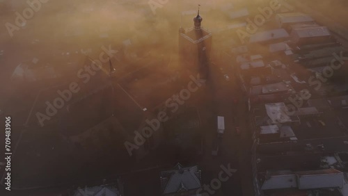 Aerial drone view of church foggy morning, Workum, Friesland, Netherlands photo