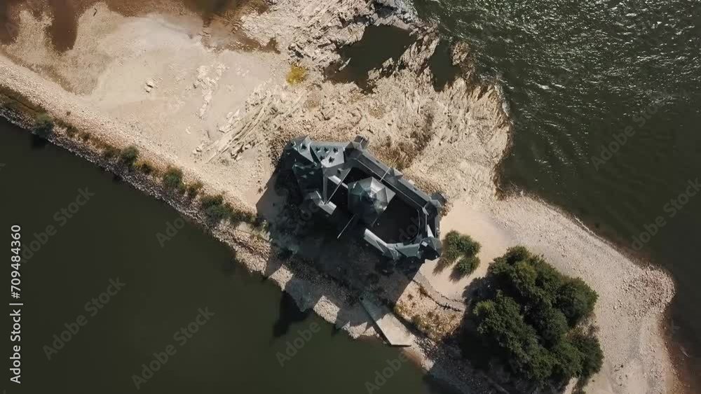 A drone corkscrews rising away from the Pfalzgrafenstein tax collection castle on the Rhine river A drone corkscrews rising away from the Pfalzgrafenstein tax collection castle on the Rhine river