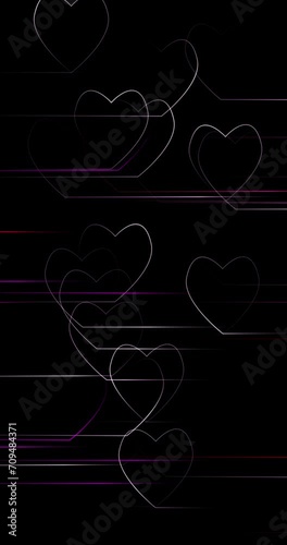 Seamless loop fast drawing hearts on black vertical background.