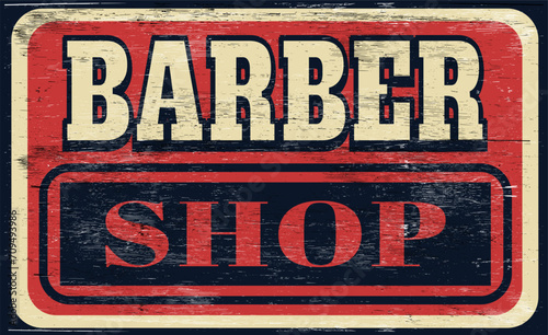 Aged and worn vintage barber shop sign 