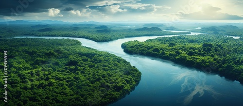 Aerial drone view, the bend of the river with stretches of deep forest.