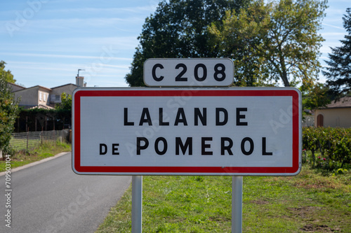 City road sign Lalande de Pomerol near Saint-Emilion wine making region, growing of Merlot or Cabernet Sauvignon red wine grapes, France, Bordeaux