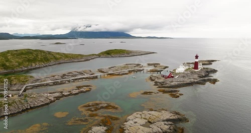 Tranoy Fyr Lighthouse On The Island Of Tranøy, Nordland, Norway. Aerial Drone Shot  photo