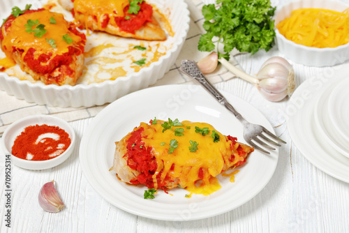 baked juicy chicken breasts with tomatoes, cheese