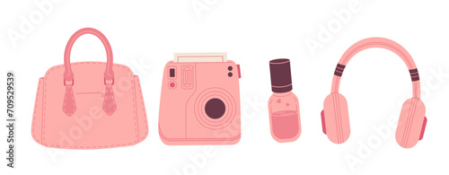 Pink handbag, instant camera, wireless headphones, skin serum. walking items set. women's accessories in pink color collection