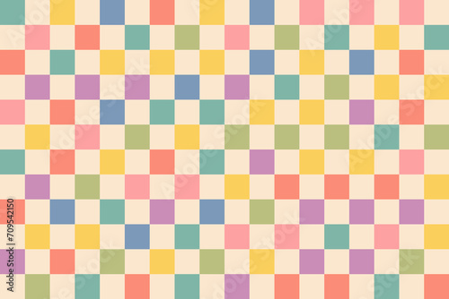 Colorful checkered hippie pattern. Abstract aesthetic geometric background. Fashion textile print with colorful checkerboard texture. Randomly scattered colors with groovy psychedelic effect.