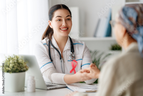 Female patient listening to doctor photo
