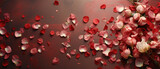 Rose petals on dark red background with copy space for text.