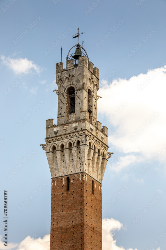 Fototapeta premium Siena, Italy - July 26, 2023: Torre del Mangia in Siena, Italy
