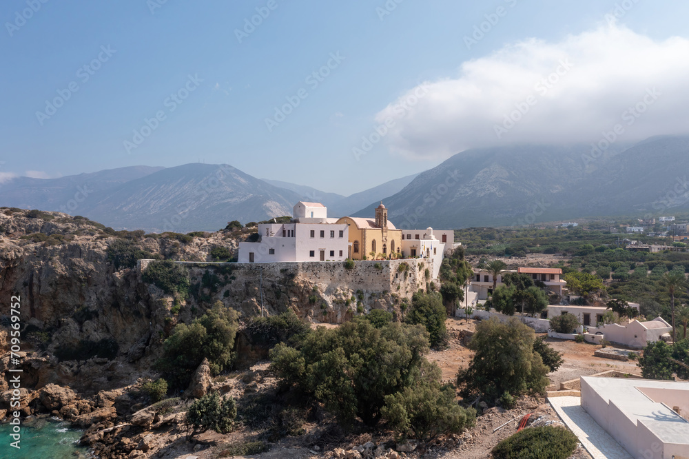 Chrysoskalitissa Monastery built up on rock, Chania town Creete island, Greeece. Aerial drone view.