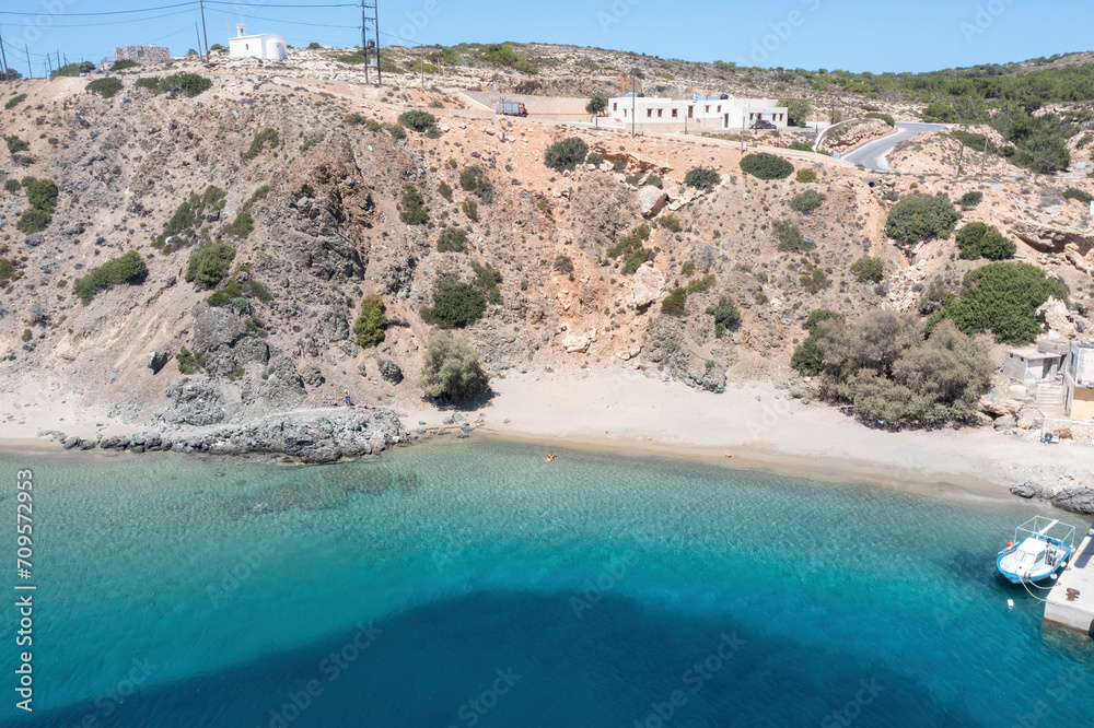 Gavdos island, Crete, Greece. Aerial drone view of sandy beach, people swim in vast sea water.