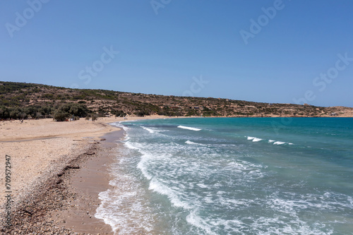 Greece. Aerial drone view of Gavdos beach, Crete island. Wild landscape, ripple sea water, blue sky.