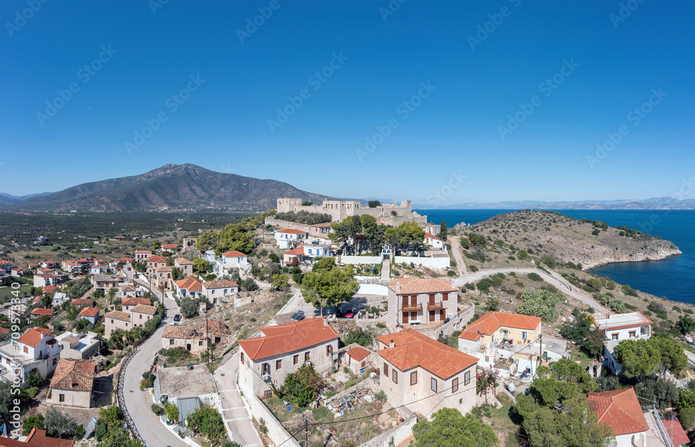 Astros, Arcadia, Peloponnese, Greece. Aerial drone panoramic view of village, castle, sea, blue sky.