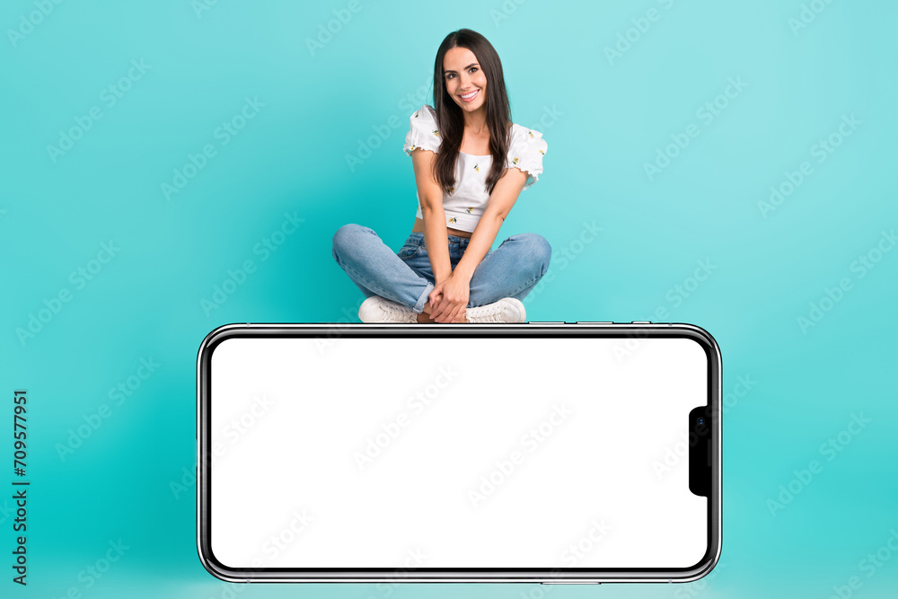 Full length photo of cute charming girl dressed white top chatting modern device empty space isolated teal color background Full length photo of cute charming girl dressed white top chatting modern device empty space isolated teal color background