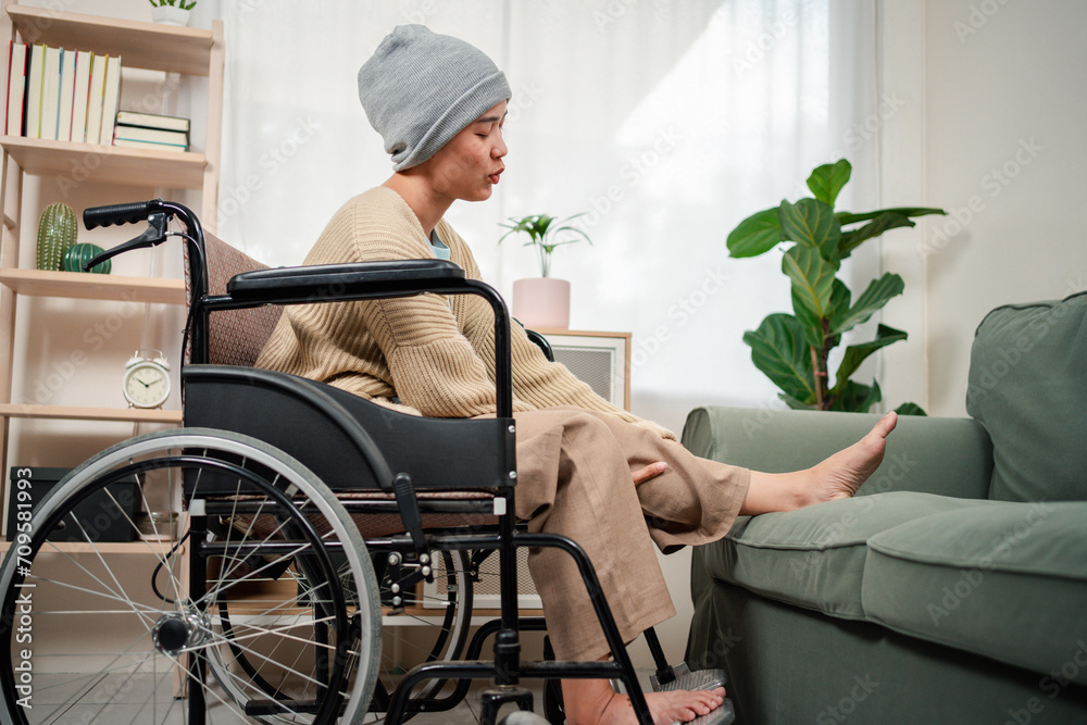 Young woman have a sick with cancer her worry and stress feeling lifestyle in living room at home. Young woman have a sick with cancer her worry and stress feeling lifestyle in living room at home.