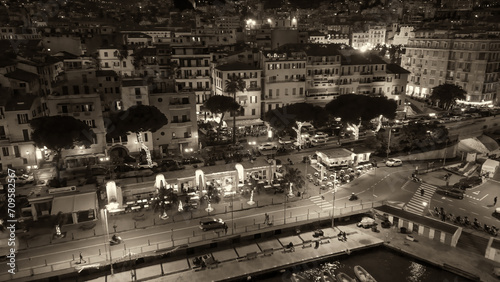 Aerial view of Sanremo at night  Italy. Port and city buildings