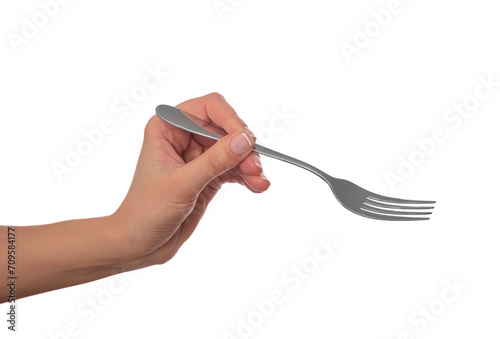 Fork in a woman's hand on a white background.