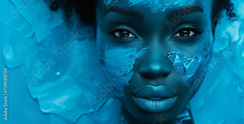 Beautiful African face front view on bright blue wall background, Concept of beauty, makeup, cosmetics..