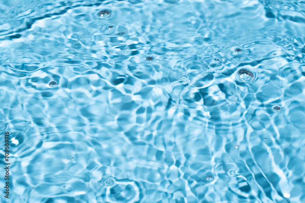 Water surface waving Close-up . Blue Water Flowing Water surface waving Close-up . Blue Water Flowing