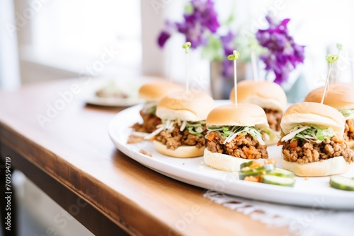 sloppy joe sliders on a platter for a party setting photo