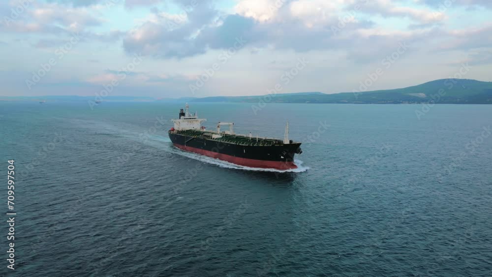 Oil tanker ship transport cargo underway through Dardanelles Strait in Turkey. Worldwide logistic of oil and global trade Oil tanker ship transport cargo underway through Dardanelles Strait in Turkey. Worldwide logistic of oil and global trade