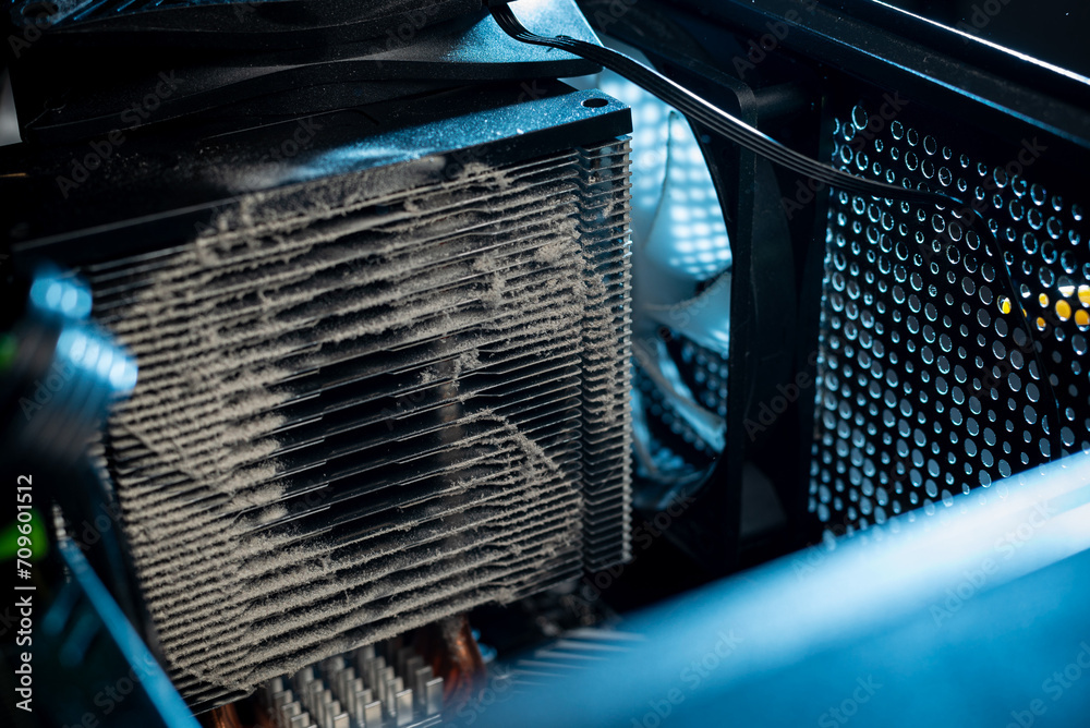 Close-up of a PC cooling system, a dirty radiator from a computer - obrazy, fototapety, plakaty 