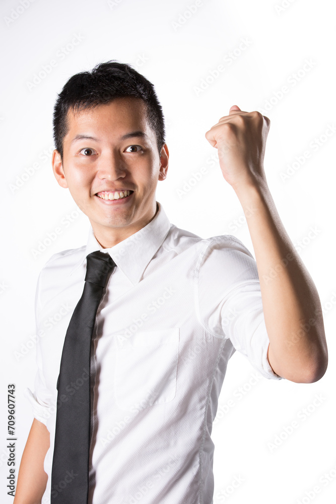 Asian businessman celebrating.