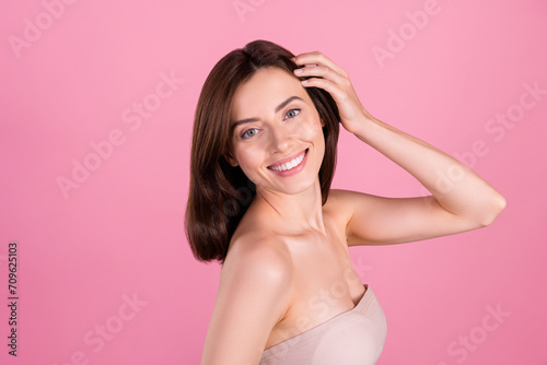 Photo of aesthetic girl touch hair adjust after morning bath shower wash shampoo with anti dander effect isolated pastel color background