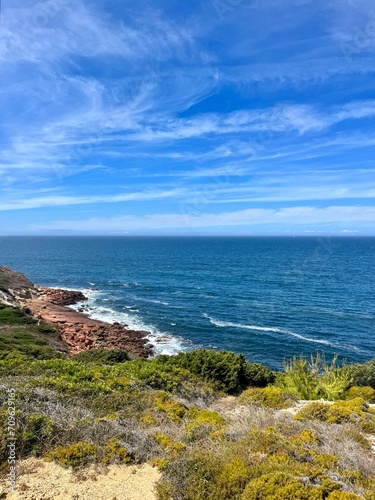 Beautiful rocky ocean coast, blue ocean horizon, natural ocean view