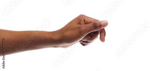 Fotografía African american woman holding something in fist, ready to share