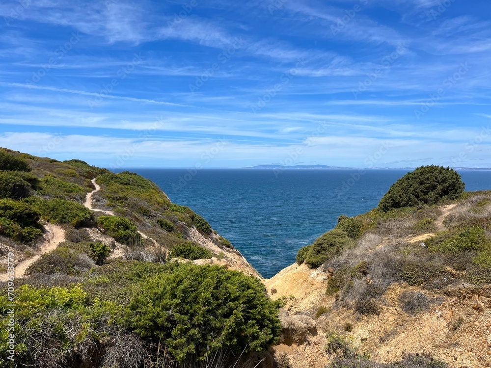 Beautiful rocky ocean coast, blue ocean horizon, natural ocean view