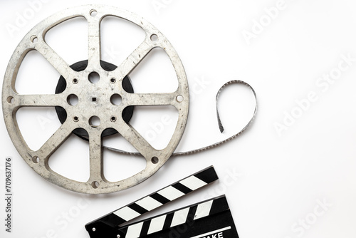 Film reels and clapperboard - cinema and filmmaker concept