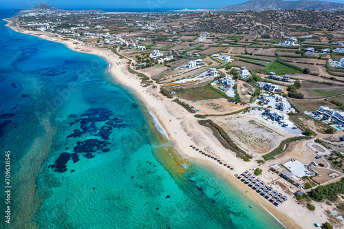 Aerial view of the beautiful Plaka area with sandy beaches and emerald sea at Naxos island, Cyclades, Greece
