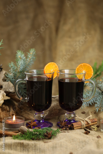 Glasses with mulled wine and spices