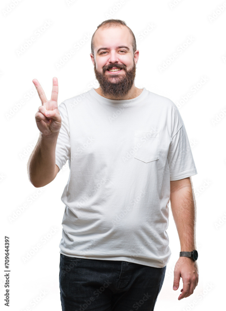 Young caucasian hipster man wearing casual t-shirt over isolated background showing and pointing up with fingers number two while smiling confident and happy. Young caucasian hipster man wearing casual t-shirt over isolated background showing and pointing up with fingers number two while smiling confident and happy.