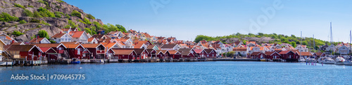 Hunnebostrand, Sweden - May 24, 2023: Panorama of the fishing town and tourist resort of Hunnebostrand in the swedish municipality of Sotenas, Vastra Gotaland province. photo