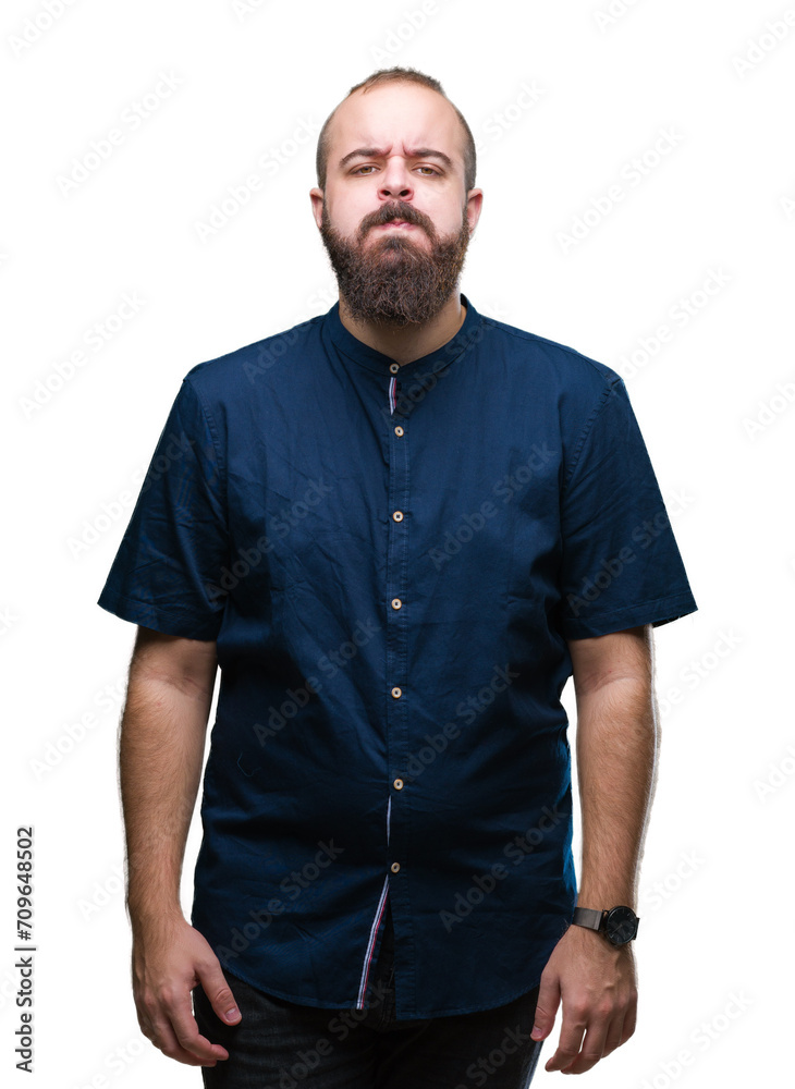 Young caucasian hipster man over isolated background puffing cheeks with funny face. Mouth inflated with air, crazy expression. Young caucasian hipster man over isolated background puffing cheeks with funny face. Mouth inflated with air, crazy expression.