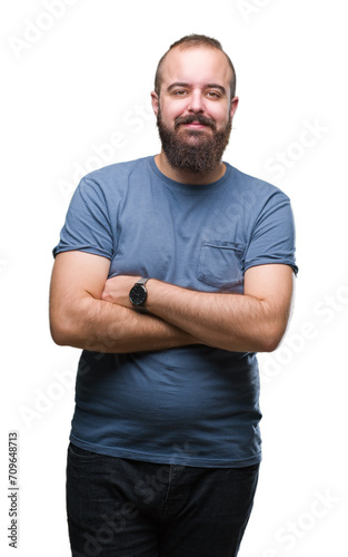 Young caucasian hipster man over isolated background happy face smiling with crossed arms looking at the camera. Positive person.