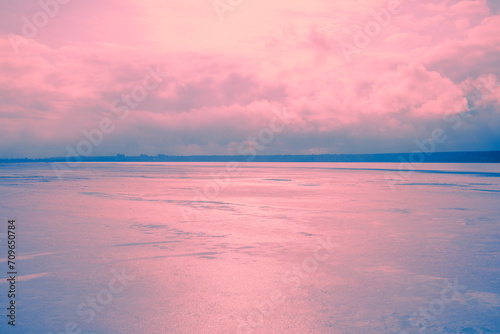 View of the lake and cloudy sky at sunset. Panoramic view from above at Pink Lake. Minimalist landscape