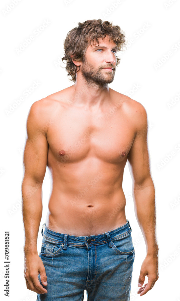 Handsome hispanic model man sexy and shirtless over isolated background looking away to side with smile on face, natural expression. Laughing confident. Handsome hispanic model man sexy and shirtless over isolated background looking away to side with smile on face, natural expression. Laughing confident.