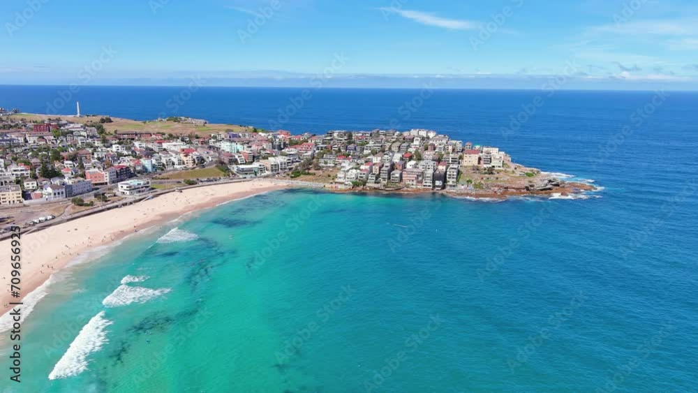 Sydney, Australia: Aerial view of iconic Bondi Beach, famous surf beach in capital city of Australian state of New South Wales and most populous city in Australia, sunny day with clear blue sky Sydney, Australia: Aerial view of iconic Bondi Beach, famous surf beach in capital city of Australian state of New South Wales and most populous city in Australia, sunny day with clear blue sky
