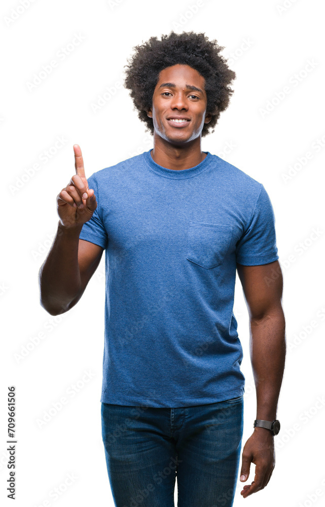 Afro american man over isolated background showing and pointing up with finger number one while smiling confident and happy. Afro american man over isolated background showing and pointing up with finger number one while smiling confident and happy.