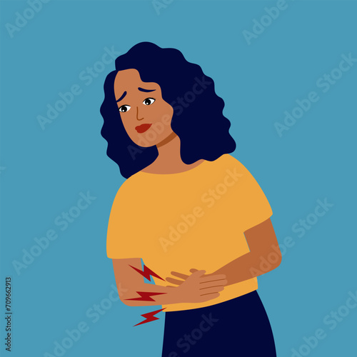 Painful female period pain concept. Woman standing and suffering menstrual abdominal pain. Stomachache.