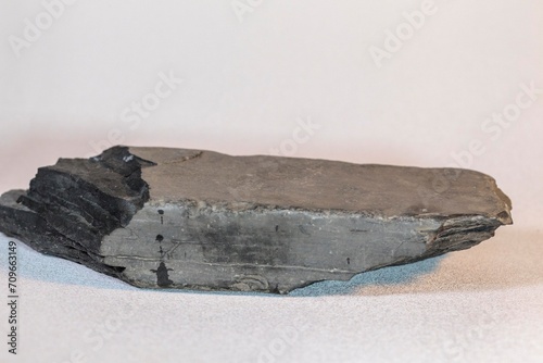 outside angle of gray a flat brick shaped rock found many years ago